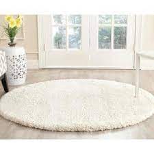 Photo 1 of 5 foot round valet rug color white 