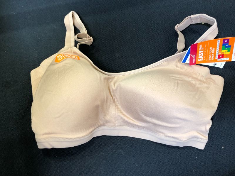 Photo 2 of Warner's Women's Easy Does It Underarm Smoothing with Seamless Stretch Wireless Lightly Lined Comfort Bra RM3911A, Toasted Almond, XL

