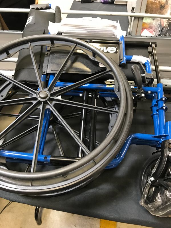 Photo 1 of Drive Medical BLS18FBD-ELR Blue Streak Lightweight Wheelchair with Swing-Away Elevating Leg Rests and Flip-Back Arms
