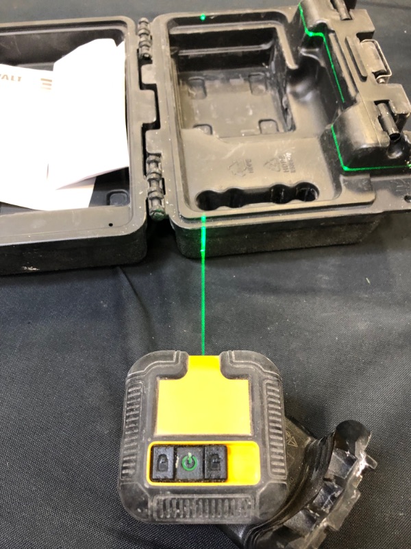 Photo 2 of DEWALT Laser Level, Green Cross, 55-Foot (DW08802CG) [ power works ] dirty from previous usage 