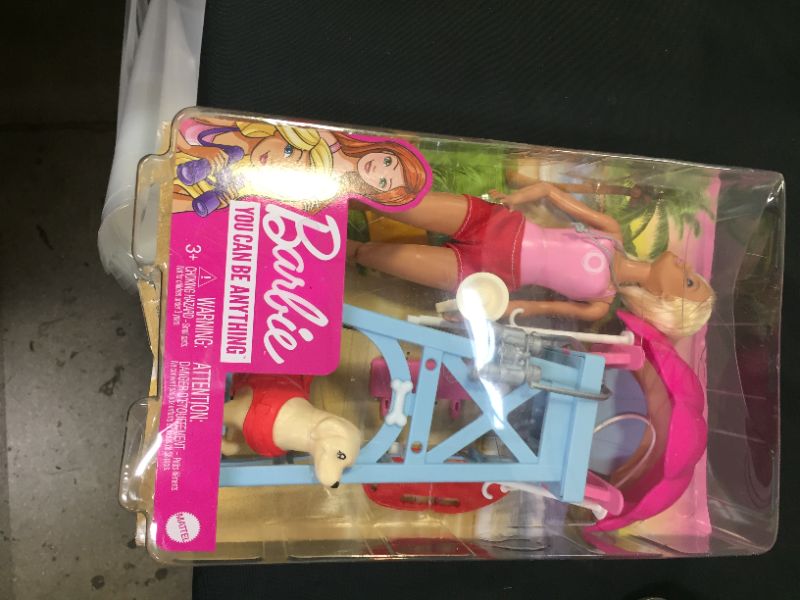 Photo 2 of Barbie Lifeguard Playset, Blonde Doll (12-in), Swim Outfit, Lifeguard Chair, Umbrella, Megaphone, Binoculars, 2 Flags, Dog Figure & More, Great Gift for Ages 3 & Up
