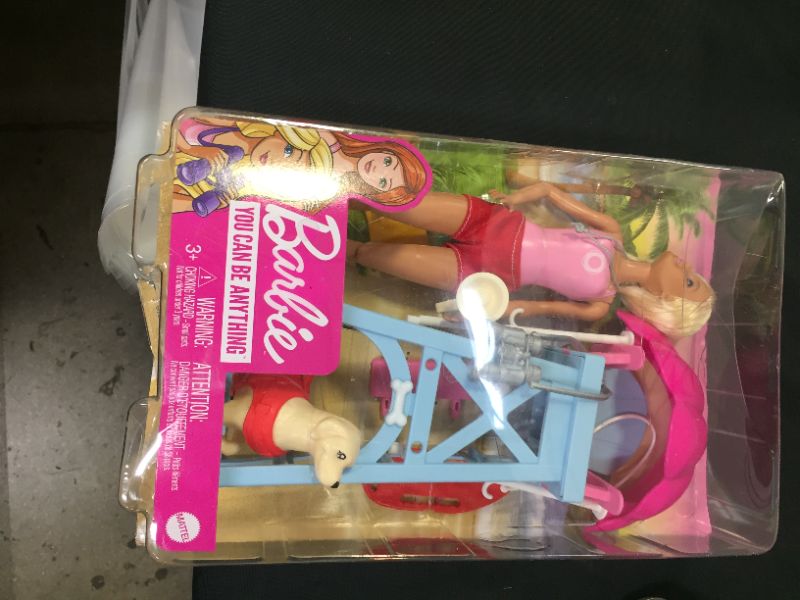 Photo 1 of Barbie Lifeguard Playset, Blonde Doll (12-in), Swim Outfit, Lifeguard Chair, Umbrella, Megaphone, Binoculars, 2 Flags, Dog Figure & More, Great Gift for Ages 3 & Up

