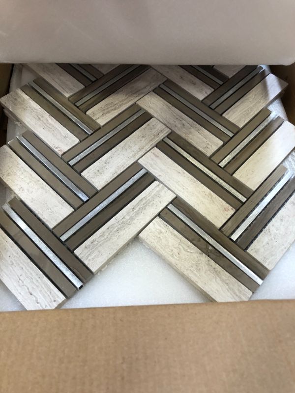 Photo 2 of FABULOUS DECOR WHITE SILVER CHEVRON MOSAIC 12X11.4 (4 TILES, 8MM THICK)---ONE OF THE TILES HAS A CRACK---