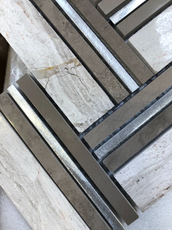 Photo 1 of FABULOUS DECOR WHITE SILVER CHEVRON MOSAIC 12X11.4 (4 TILES, 8MM THICK)---ONE OF THE TILES HAS A CRACK---