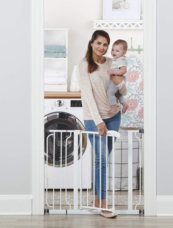 Photo 1 of Regalo Easy Step 38.5-Inch Extra Wide Walk Thru Baby Gate, Includes 6-Inch Extension Kit, 4 Pack Pressure Mount Kit, 4 Pack Wall Cups and Mounting Kit
