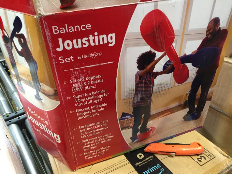 Photo 2 of HearthSong Indoor/Outdoor Balance Jousting Set for Active Kids' Play, Includes Two Inflatable Boppers and Two Balance Boards
