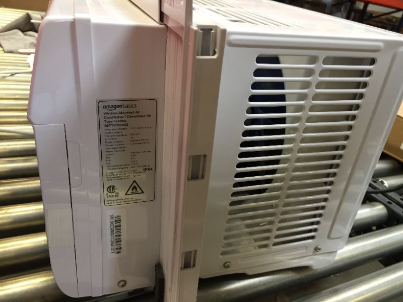 Photo 7 of Amazon Basics Window-Mounted Air Conditioner with Remote - Cools 250 Square Feet, 6000 BTU, Energy Star, Energy Star
