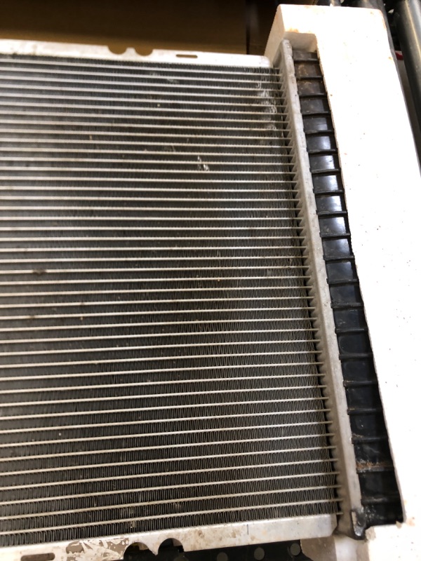 Photo 2 of 18.5X40X1" RADIATOR, UNKNOWN MAKE/MODEL.
USED, VERY DIRTY, UNKNOWN IF HAS ANY LEAKS, ALL FINNS LOOK GOOD NO MAJOR BENDS OR DENTS.