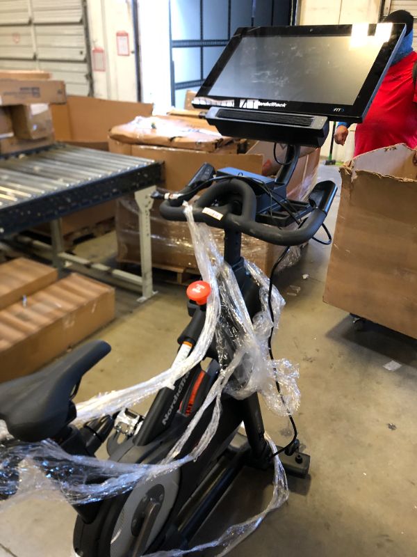 Photo 1 of NordicTrack Commercial S22i Studio Cycle with UPGRADED 22” HD Touchscreen - Black - NO BOX - ITEM IS DIRTY AND HAS MARKS FROM EXPOSURE - 