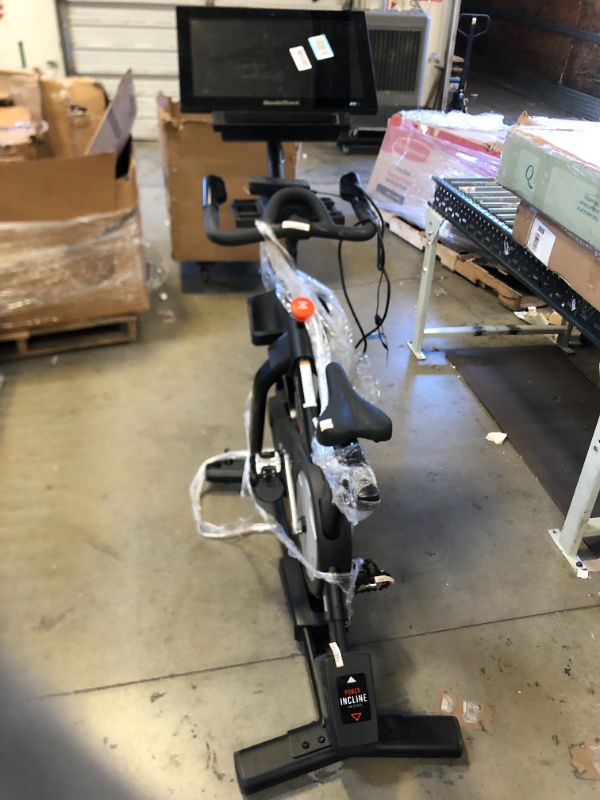Photo 1 of NordicTrack Commercial S22i Studio Cycle with UPGRADED 22” HD Touchscreen - Black - NO BOX - ITEM IS DIRTY AND HAS MARKS FROM EXPOSURE - 