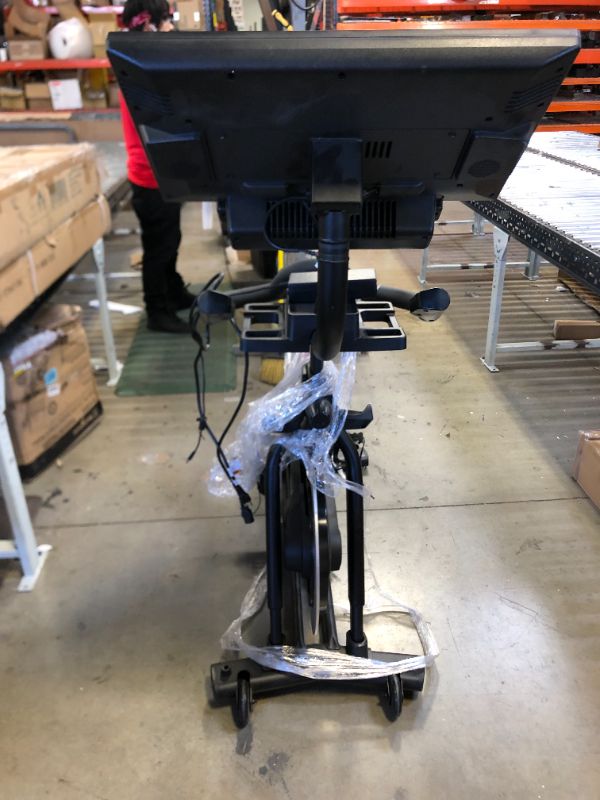 Photo 1 of NordicTrack Commercial S22i Studio Cycle with UPGRADED 22” HD Touchscreen - Black - NO BOX - ITEM IS DIRTY AND HAS MARKS FROM EXPOSURE - 