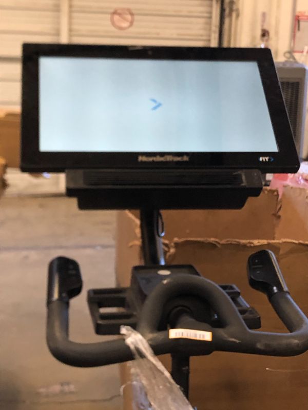 Photo 1 of NordicTrack Commercial S22i Studio Cycle with UPGRADED 22” HD Touchscreen - Black - NO BOX - ITEM IS DIRTY AND HAS MARKS FROM EXPOSURE - 