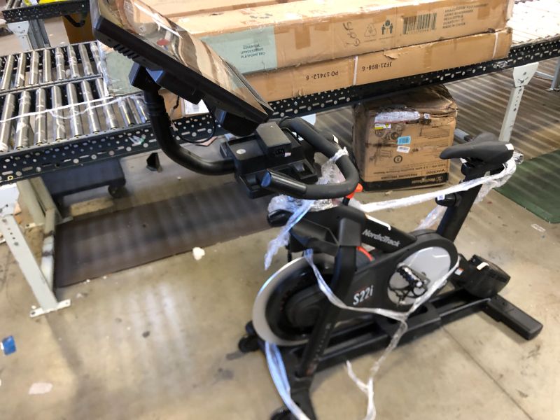 Photo 1 of NordicTrack Commercial S22i Studio Cycle with UPGRADED 22” HD Touchscreen - Black - NO BOX - ITEM IS DIRTY AND HAS MARKS FROM EXPOSURE - 