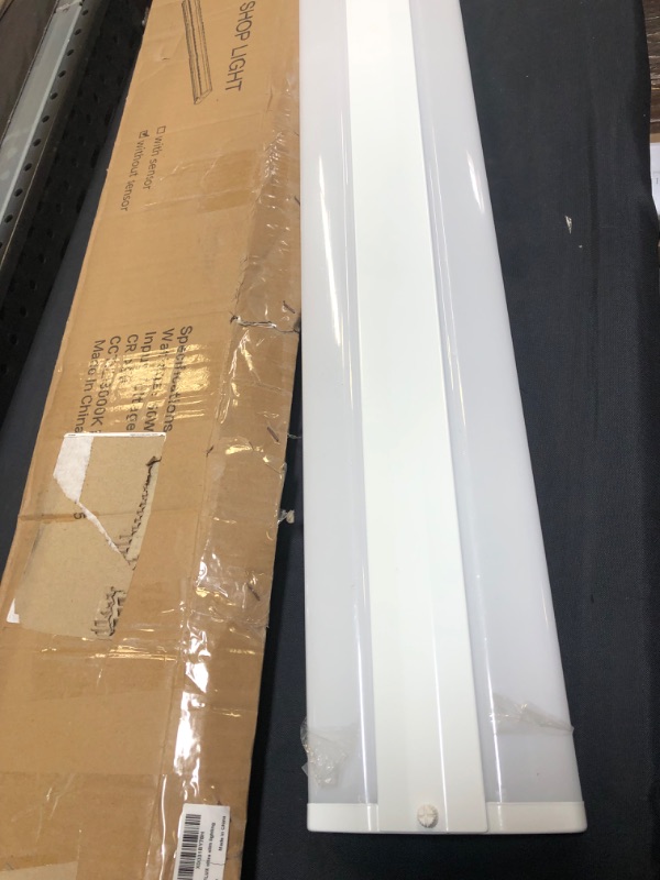 Photo 5 of AntLux 4FT LED Wraparound Light Fixture 50W Ultra Slim LED Shop Lights for Garage, Eye Care, 5500 Lumens, 4000K Neutral White, 4 Foot Flush Mount Office Ceiling Wrap Light for Workshop Kitchen Laundry UNABLE TO TEST FOR PROPER FUNCTION IN WAREHOUSE  MINOR