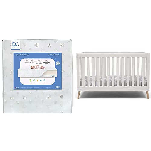 Photo 1 of Delta Children Essex 4-in-1 Convertible Baby Crib, Bianca White with Natural Legs
