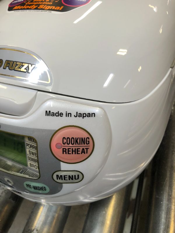 Photo 2 of Zojirushi, Made in Japan Neuro Fuzzy Rice Cooker, 5.5-Cup, Premium White. Box Packaging Damaged, Minor Use

