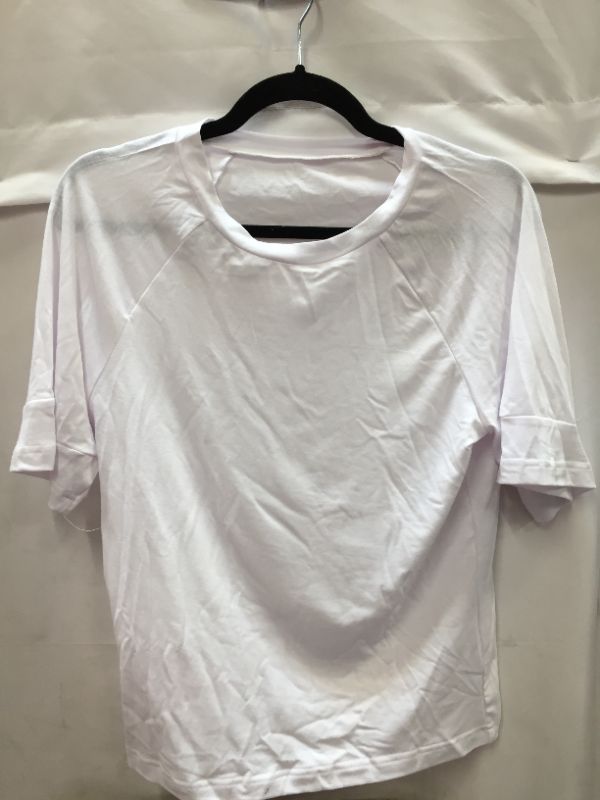 Photo 1 of WHITE SHORT SLEEVE TOP SIZE MEDIUM