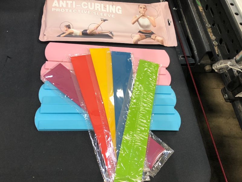 Photo 2 of NEWFLAG Resistance Band with Anti-Curling Protective Sleeve for Women, Latex Workout Bands to Exercise Butt, Legs at Home or Gym (FACTORY SEALED)
