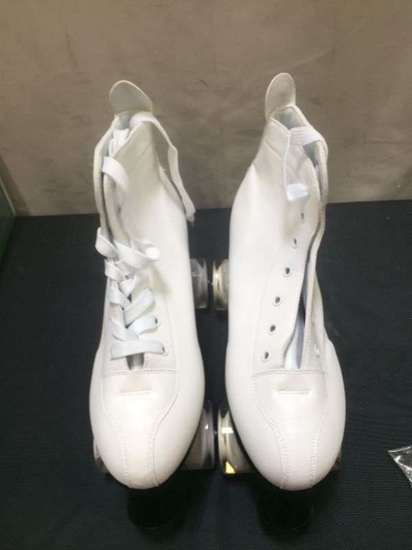 Photo 1 of WHITE QUAD SKATES SIZE 44