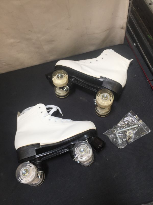 Photo 1 of WHITE QUAD SKATES SIZE 44