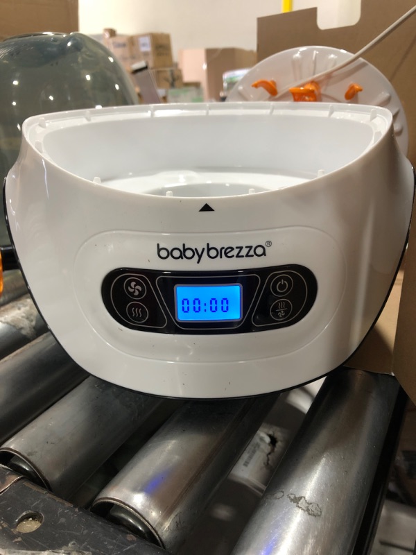 Photo 2 of Baby Brezza Baby Bottle Sterilizer and Dryer Machine – Electric Steam Sterilization - Universal Fit - Pacifiers, Glass, Plastic, and Newborn Feeding Bottles