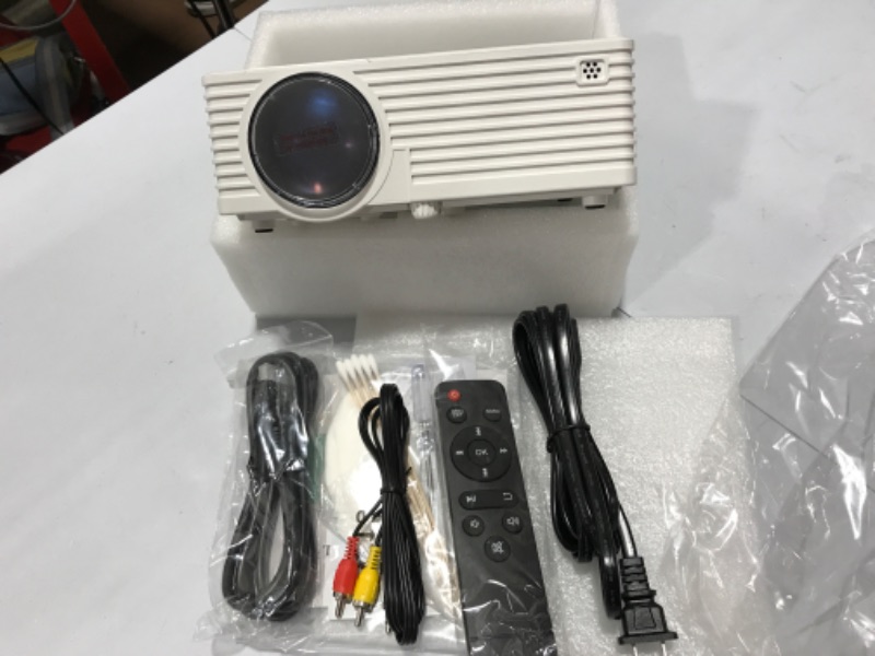 Photo 2 of Mini Video Projector with 6500 Brightness, 1080P Supported, Portable Outdoor Movie Projector, 176" Display Compatible with TV Stick, HDMI, USB, VGA, AV for Home Entertainment
