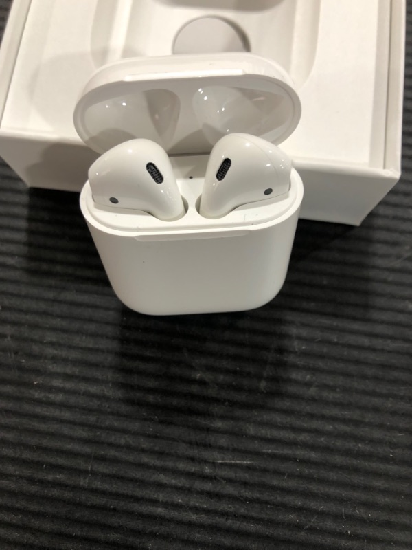 Photo 3 of Apple AirPods with Charging Case (Latest Model)