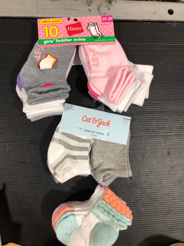 Photo 1 of 2 different packs of socks Hanes Toddler Girls' 10pk Athletic Ankle Socks - Colors May Vary 2T-3T , 12-24, unknown 

