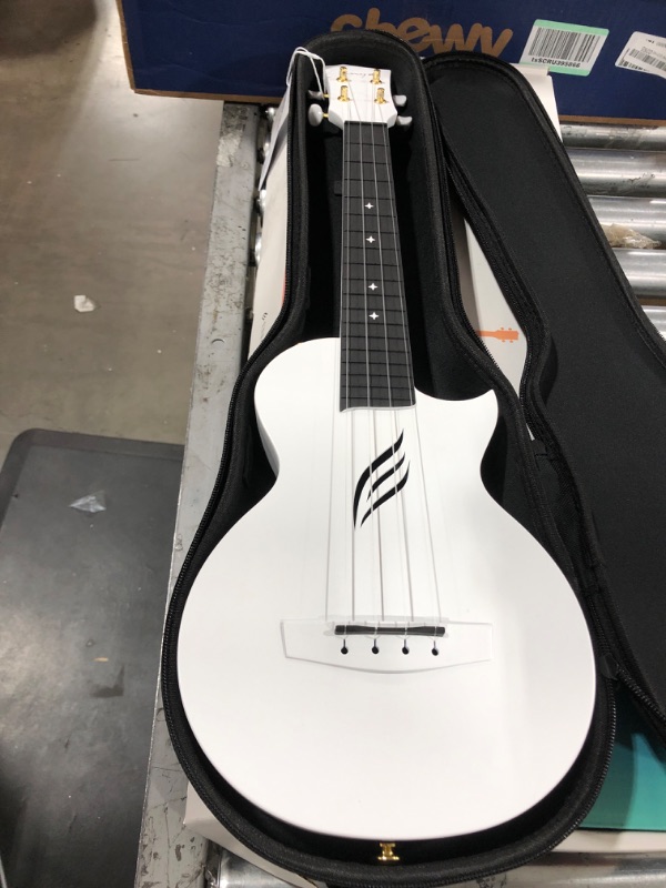 Photo 2 of Enya Tenor Ukulele 26 Inch Carbon Fiber Cutaway Travel Ukelele for Adult with Beginner Bundle Kit Including Online Video Lessons, Case, Strap, Capo and Strings?Nova U Pro White? White Acoustic