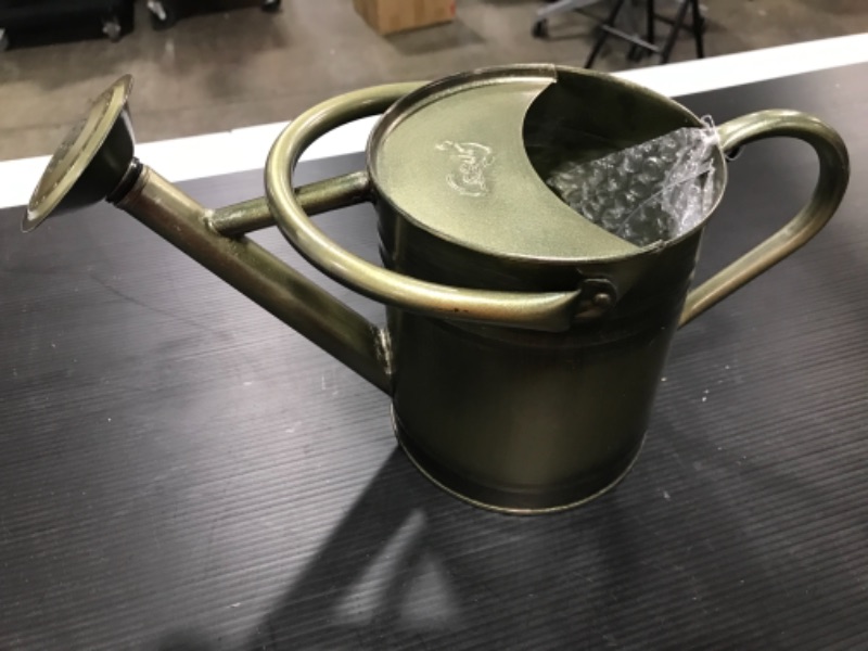 Photo 1 of 0.5 gallon watering can