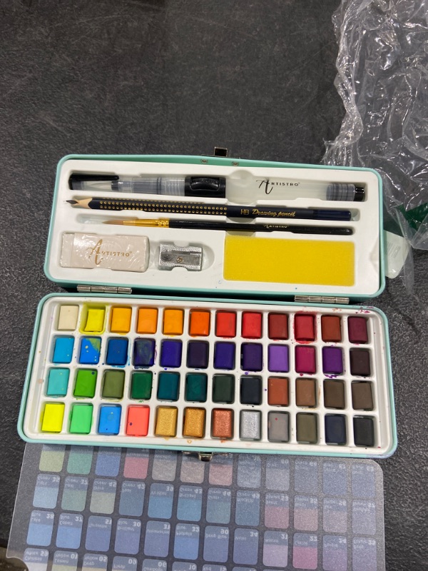 Photo 2 of ARTISTRO Watercolor Paint Set, 48 Vivid Colors in Portable Box, Including Metallic and Fluorescent Colors. Perfect Travel Watercolor Set for Artists, Amateur Hobbyists and Painting Lovers