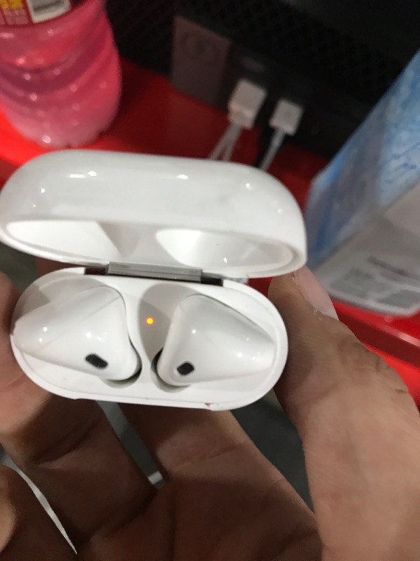 Photo 2 of Apple AirPods with Charging Case (Latest Model)