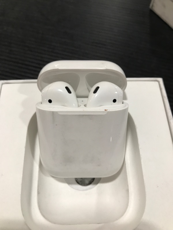 Photo 3 of Apple AirPods with Charging Case (Latest Model)