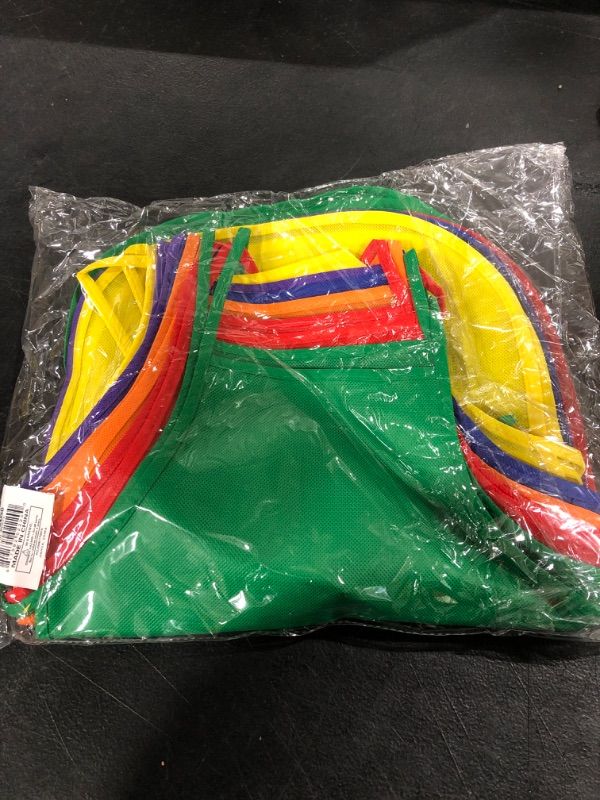 Photo 1 of Fun Central 12 Pieces - Assorted Children Artists' Aprons - Colorful Aprons for Kids in Bulk for Arts and Craft