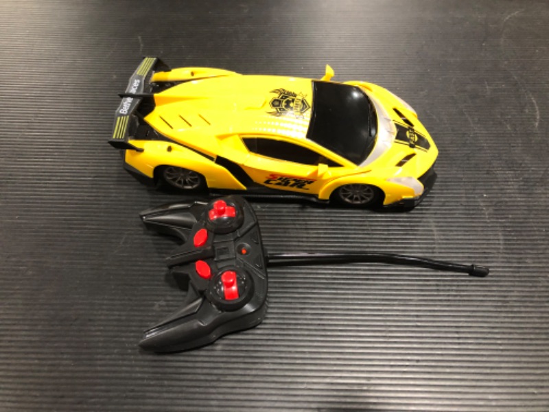 Photo 2 of Growsland Remote Control Car, RC Cars Xmas Gifts for Kids 1/18 Electric Sport Racing Hobby Toy Car Yellow Model Vehicle with Lights and Controller Kids Toys Gifts for 4 5 6 7 8-12 Year Old Boys Girls 