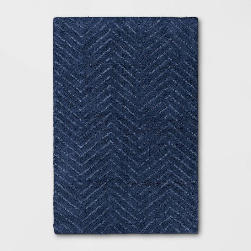 Photo 1 of 4'x6' Tufted Cotton Chevron Rug Navy - Pillowfort
