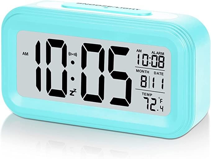 Photo 1 of SZELAM Battery Digital Alarm Clock,LCD Clock Electronic for Bedroom Home Office , with Date,Indoor Temperature,Snooze Light,Small-Sized, Backlight,Kids-Blue
