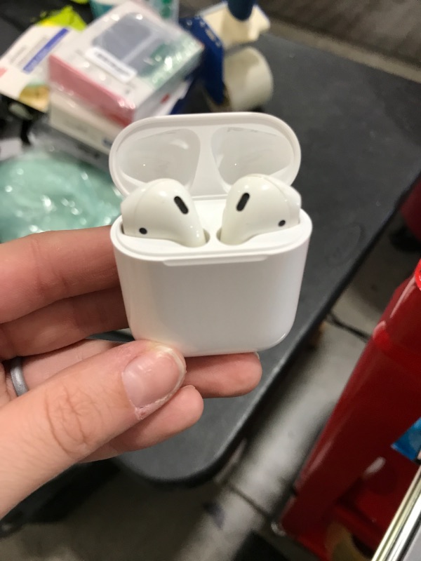 Photo 2 of Apple AirPods True Wireless Bluetooth Headphones (2nd Generation) with Charging Case
