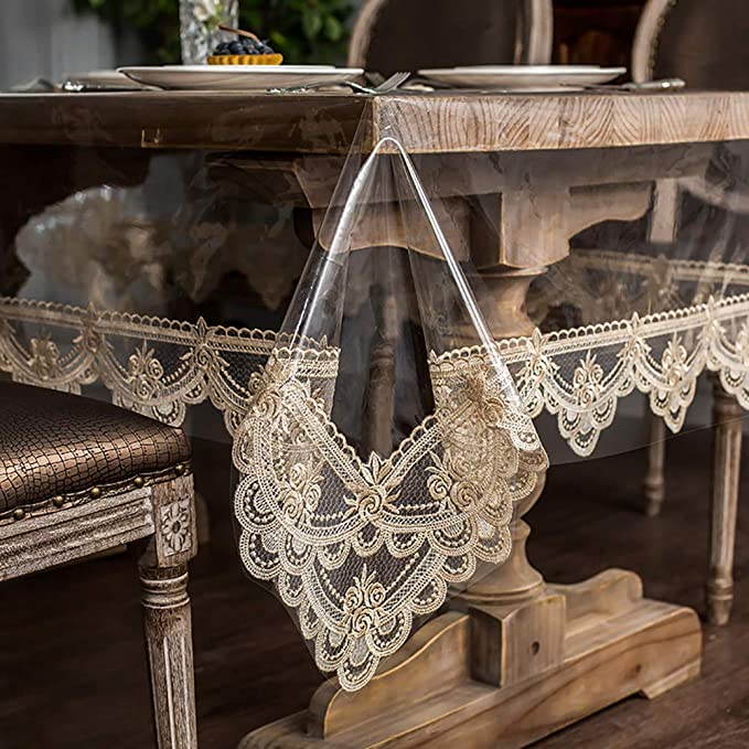 Photo 1 of ARTABLE Vinyl PVC Rectangle Lace Tablecloth Fall Waterproof Clear Table Cloths with Lace Macrame Border for Christmas Autumn Kitchen Home Dining Outdoor Indoor Holiday Decor (Champagne, 60 x 104 Inch)
