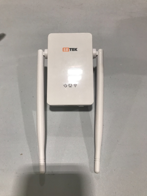 Photo 2 of DrillTop SETEK WiFi Extender Signal Booster