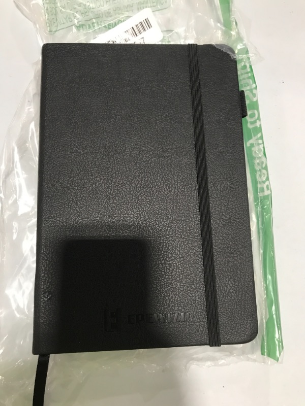 Photo 1 of EPEWIZD Fitness Journal Hardcover Workout Planner 6- Month Undated Workout Log Book Home Gym Accessories for Women and Man Black