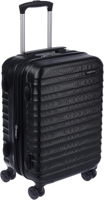 Photo 1 of Amazon Basics 23-Inch Hardside Spinner, Black
