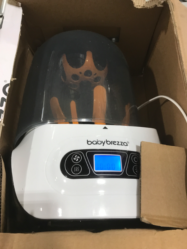 Photo 1 of Baby Brezza Baby Bottle Sterilizer and Dryer Machine – Electric Steam Sterilization - Universal Fit - Pacifiers, Glass, Plastic, and Newborn Feeding Bottles