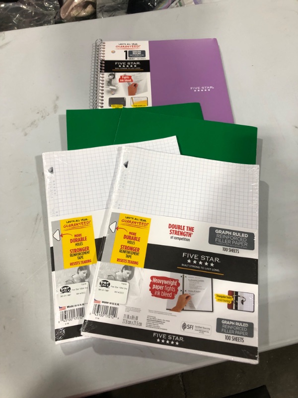 Photo 1 of 1 spiral note book 2 folders and 2 packs of 75ct graph ruled paper.
