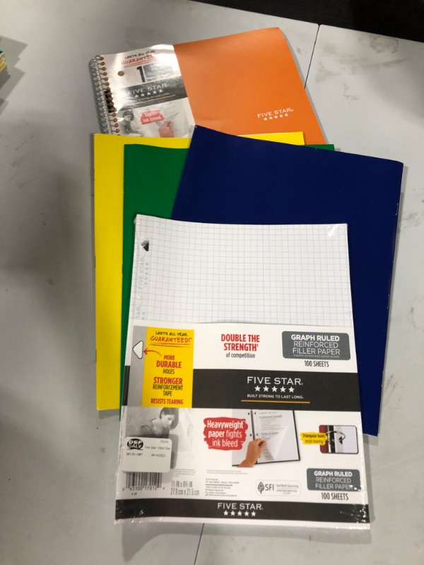 Photo 1 of 1 spiral notebook, 3 Folders and graph ruled paper
