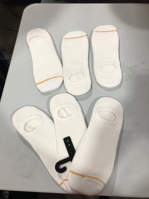 Photo 1 of 6 pairs of white no-show socks
No size listed