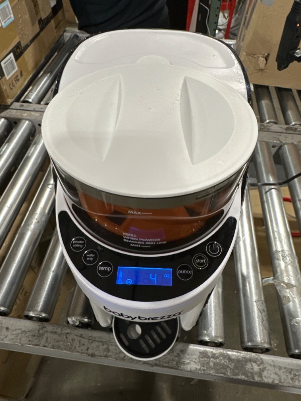 Photo 2 of New and Improved Baby Brezza Formula Pro Advanced Formula Dispenser Machine - Automatically Mix a Warm Formula Bottle Instantly - Easily Make Bottle with Automatic Powder Blending