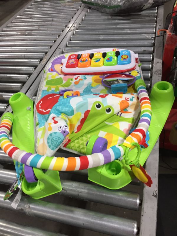Photo 1 of Fisher-Price Deluxe Kick 'n Play Piano Gym