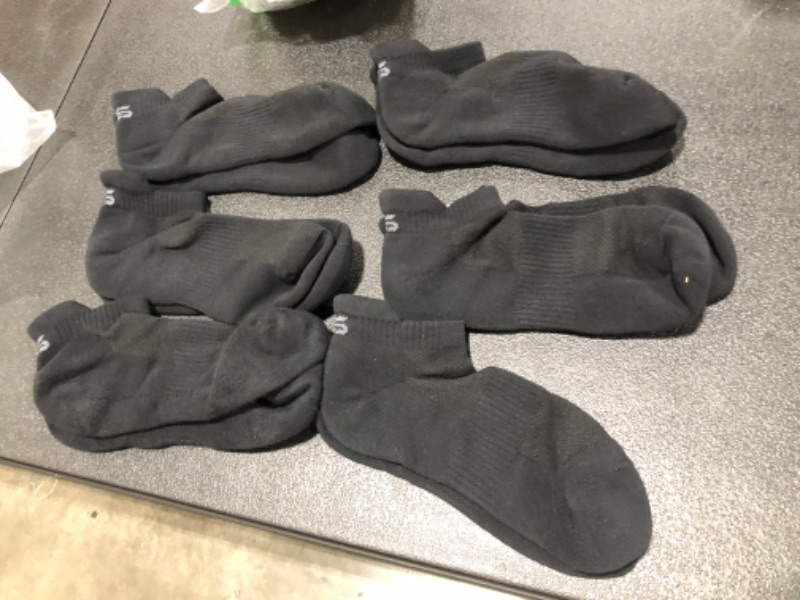 Photo 1 of 6 pairs on socks unknown size