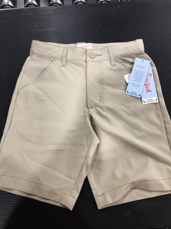 Photo 1 of A pair of khaki colored cat and jack boy shorts. SIZE:7